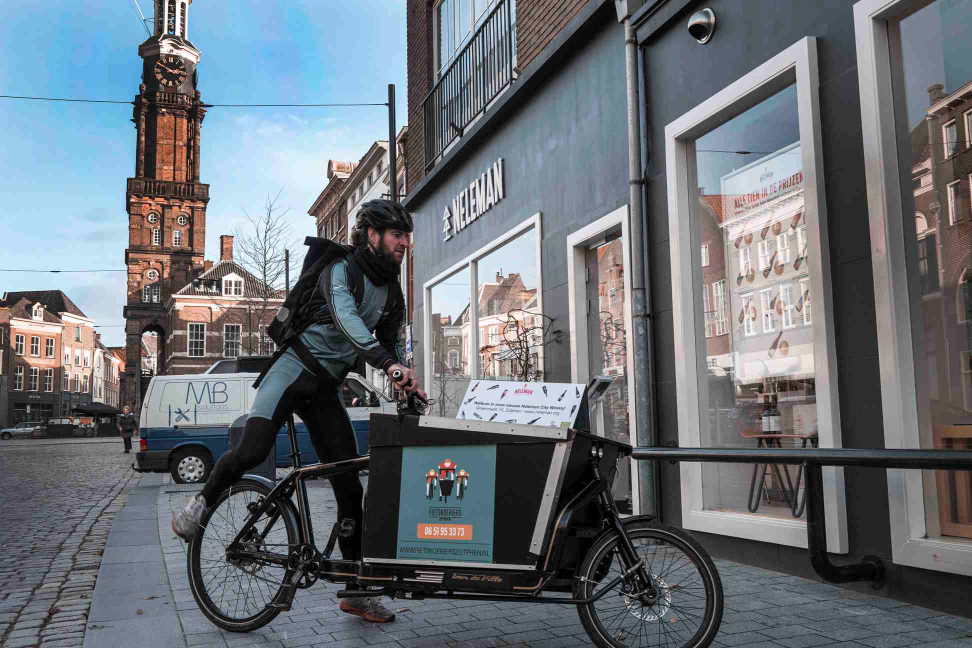 Neleman Biologische Wijnhandel foto reclame op de fiets voor neleman biologische wijnhandel